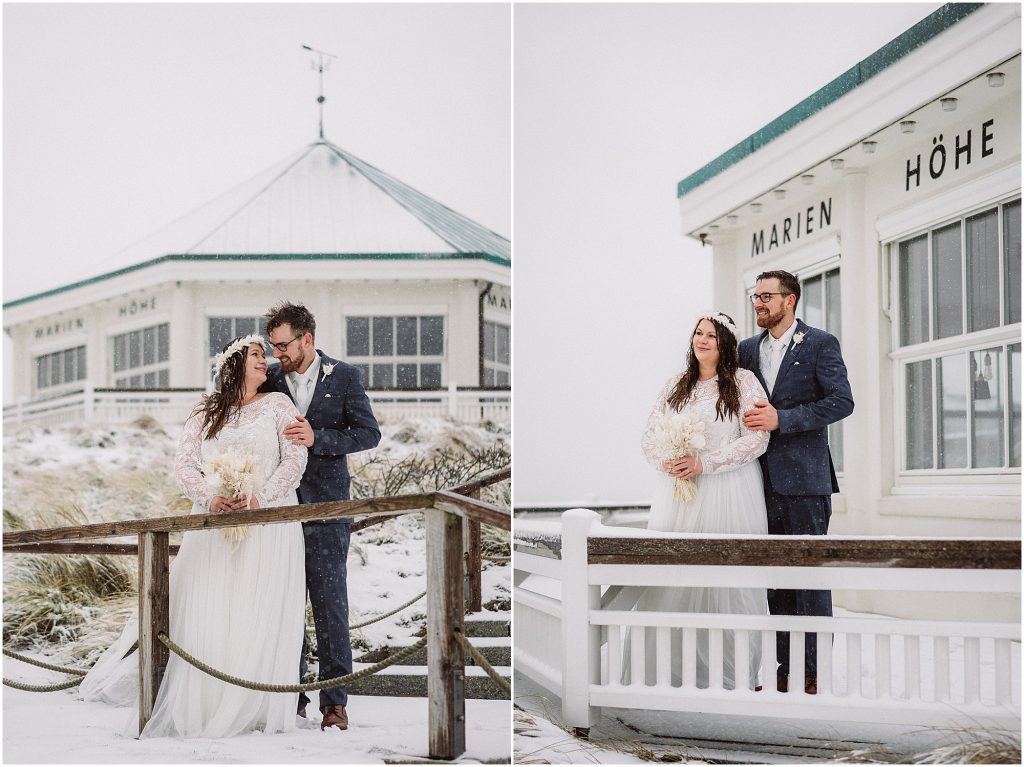 Hochzeitsfotograf Norderney – emotionales Brautpaarshooting im Schnee am Café Marienhöhe